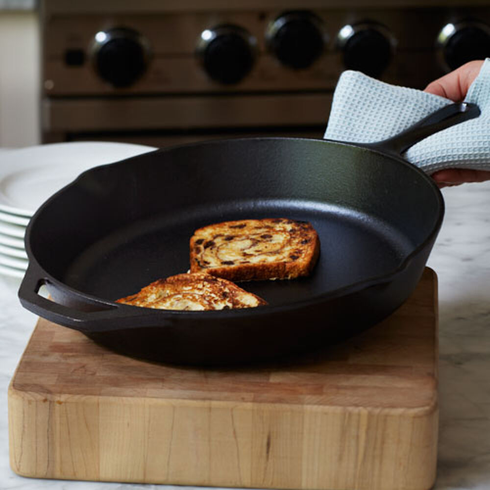 LODGE 12 INCH SEASONED CAST IRON SKILLET WITH HANDLE (SILICONE HANDLE  HOLDER INCLUDED) - Northwoods Wholesale Outlet