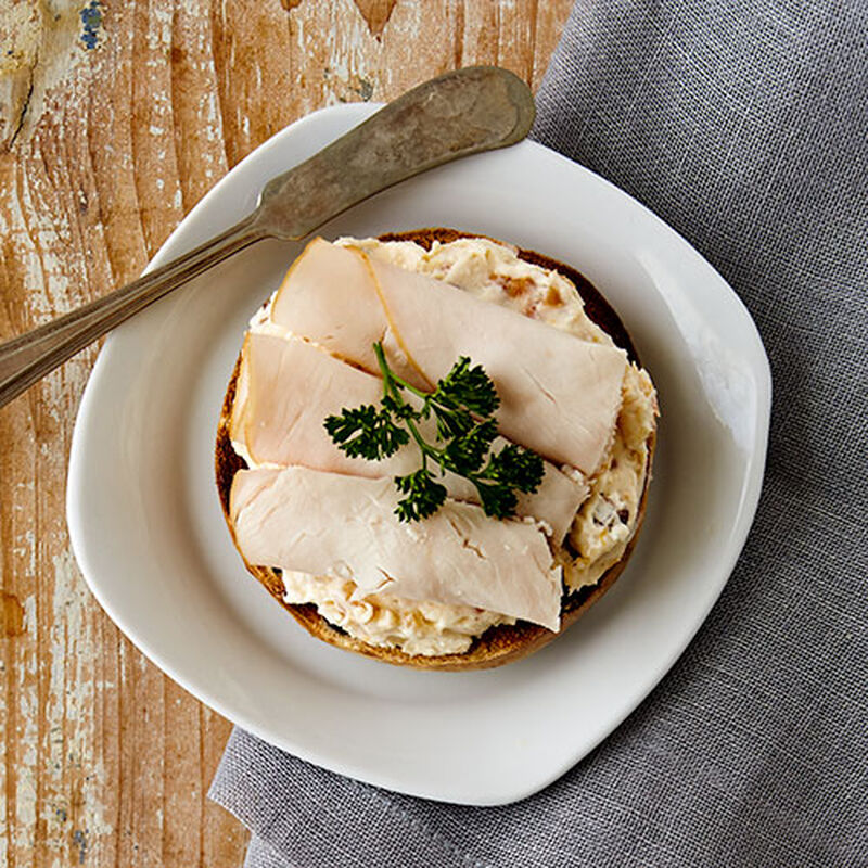 Chutney Cream Cheese topped with Smoked Turkey Breast Bagel