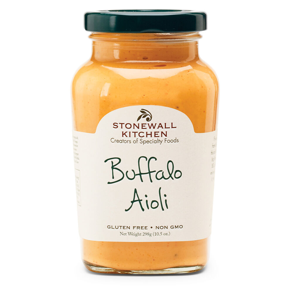 Image of a glass jar of Buffalo Aioli on a white background.